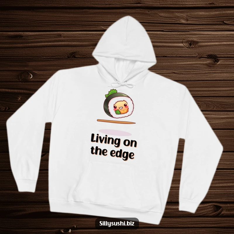 Funny sushi roll balancing on a chopstick on a cozy hoodie, offering warmth and playful charm. Ideal funny gift.